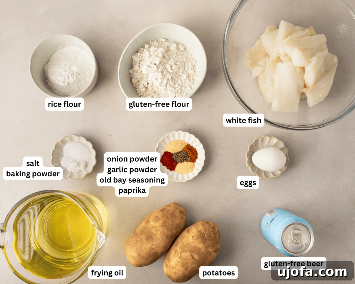 gluten-free fish and chips ingredients laid out on a wooden surface