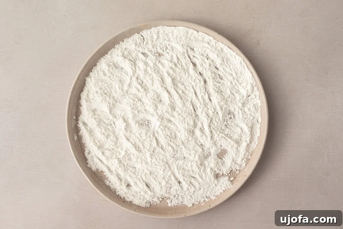 gluten-free flour mixture for dredging on a beige plate
