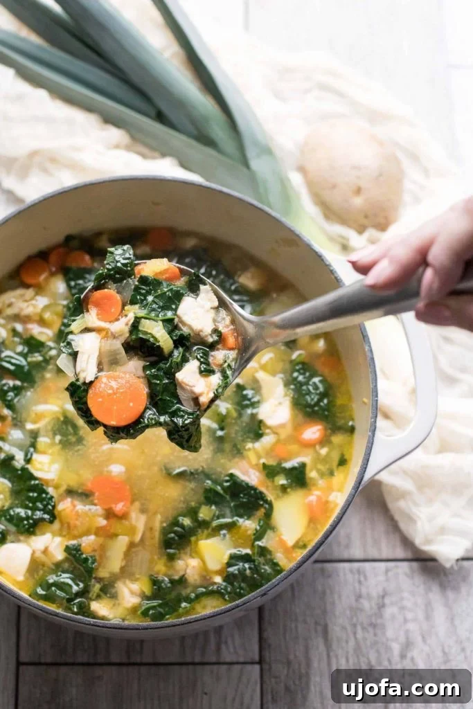 Whole30 Potato Leek Chicken Soup with kale, a hearty and healthy meal.