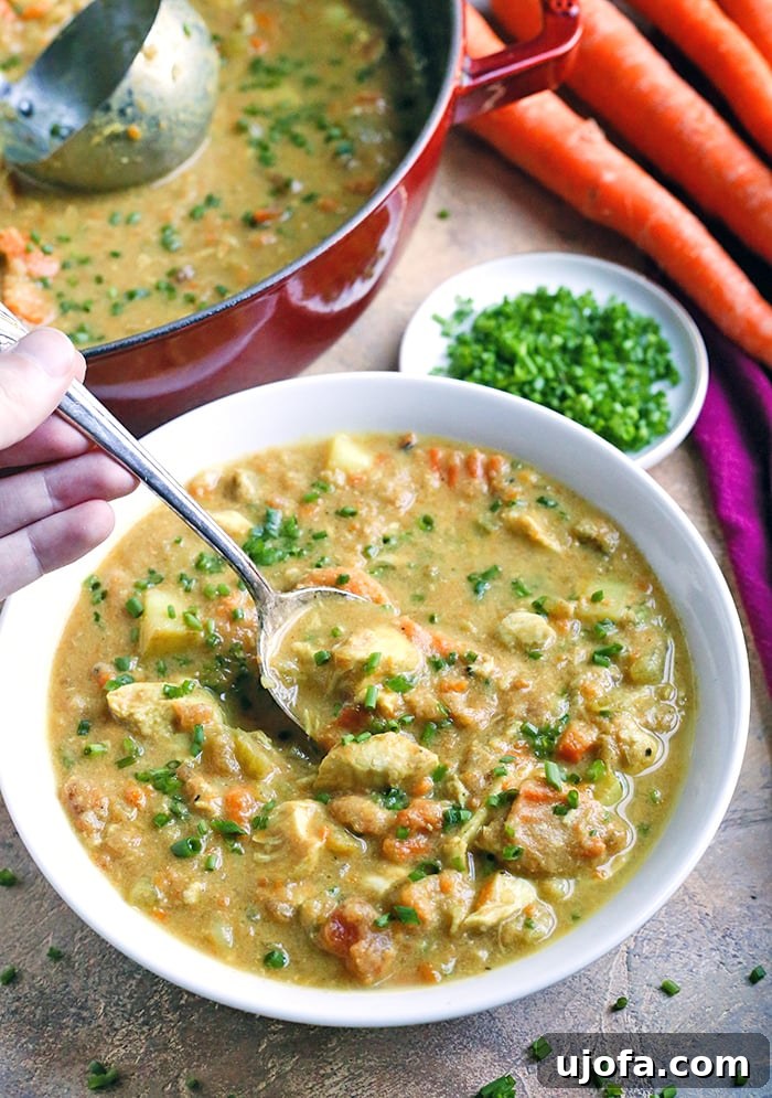 Whole30 Chicken Curry Soup, rich in flavor with tender chicken and coconut milk.