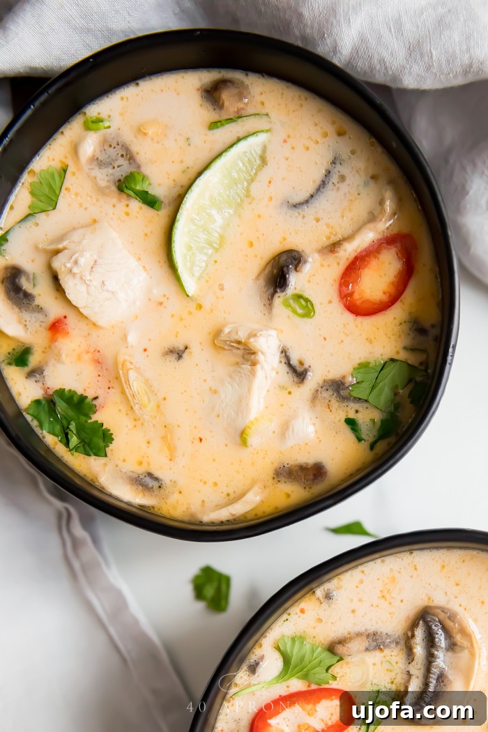 Whole30 Tom Kha Gai Soup, a fragrant Thai Coconut Chicken Soup.