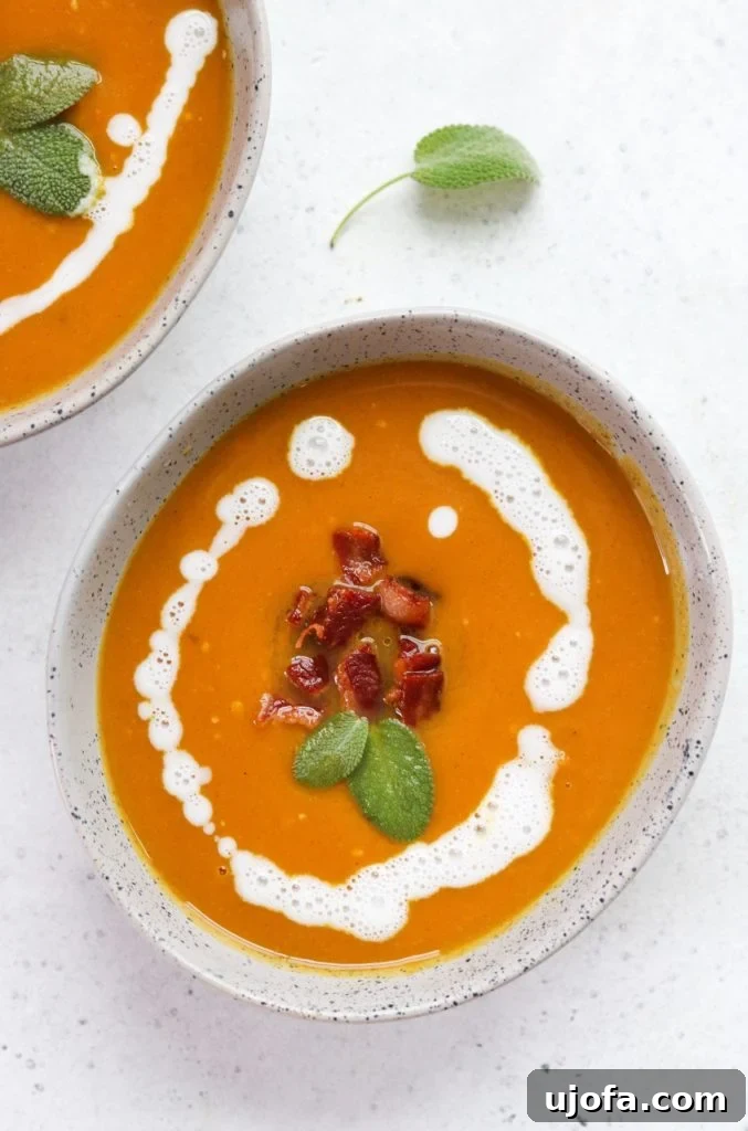 Whole30 Butternut Squash Soup with crispy bacon and fresh sage.