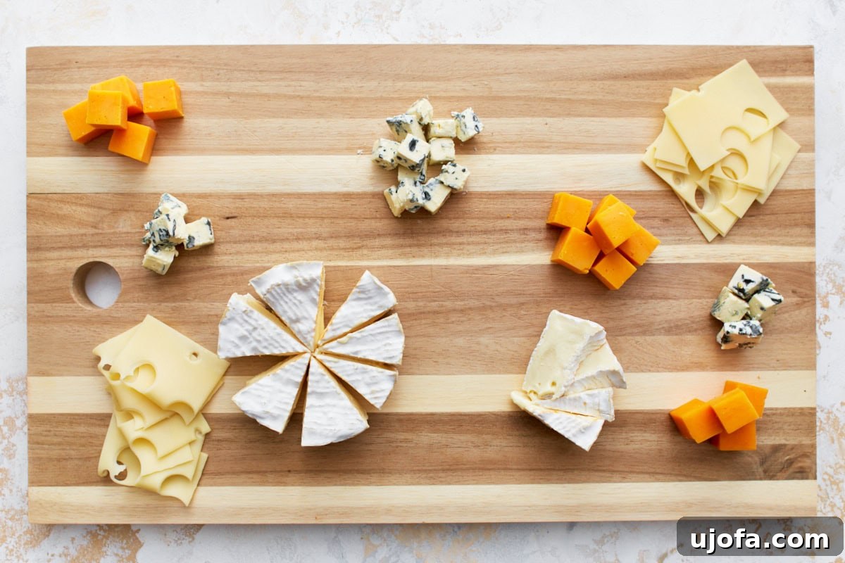 Gourmet Gluten-Free Charcuterie 6 An initial layout of cheese varieties on a wooden board. The arrangement includes wedges of Brie, cubes of cheddar, slices of Swiss cheese, and chunks of blue cheese.