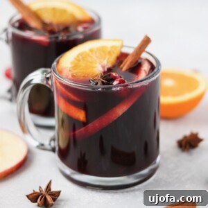 Homemade Mulled Wine: Quick Stovetop or Slow Cooker Simmer 5 Mulled Wine in a festive mug
