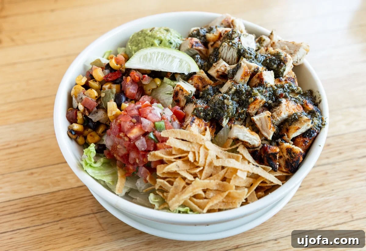 Applebees Gluten Free Dining 5 A vibrant Southwest chicken bowl from Applebee's, packed with grilled chicken, fresh vegetables, and wholesome grains, offering a delicious and gluten-free meal option.