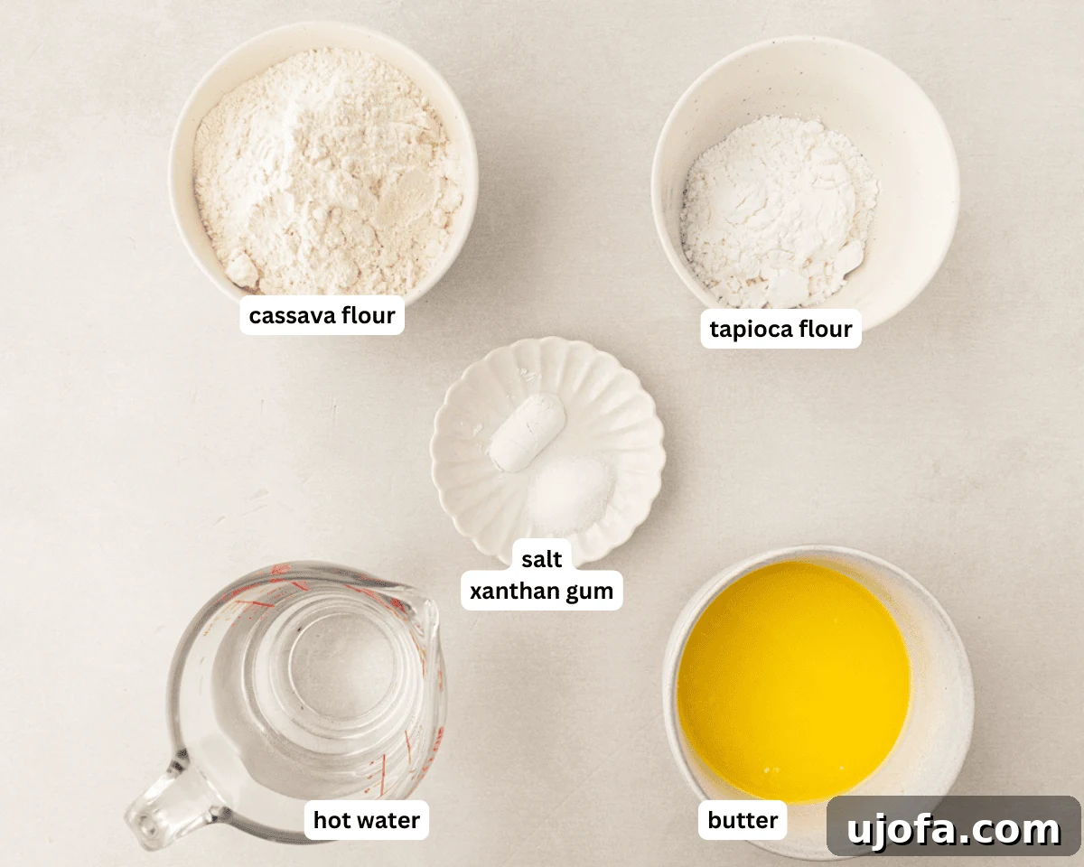 Grain-Free Cassava Wraps 4 All ingredients laid out for making cassava flour tortillas, including flours, salt, xanthan gum, butter, and hot water.