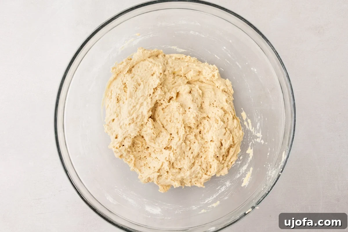 Tropical Root Bread 7 Bowl of mixed cassava bread batter with a light, fluffy texture, ready to be transferred to a loaf pan.