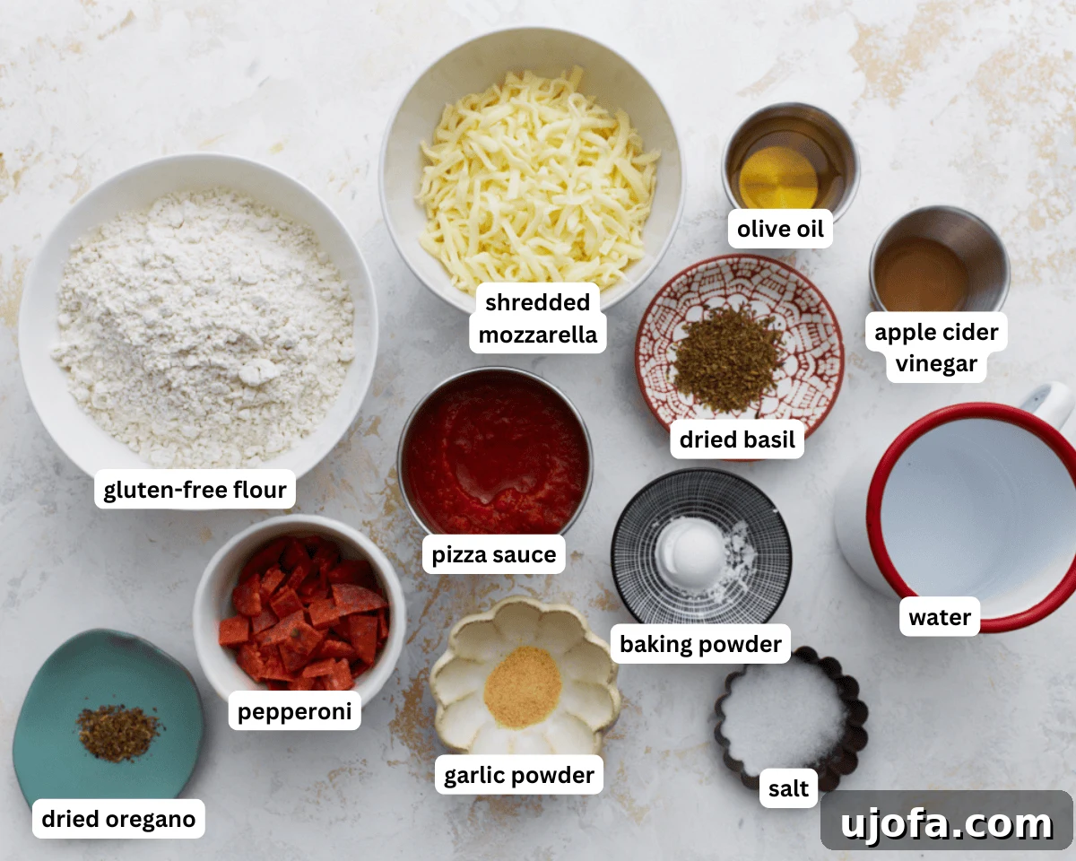 Gluten-free pizza rolls ingredients laid out on a clean surface, including flour, sauce, cheese, and pepperoni, ready for assembly.