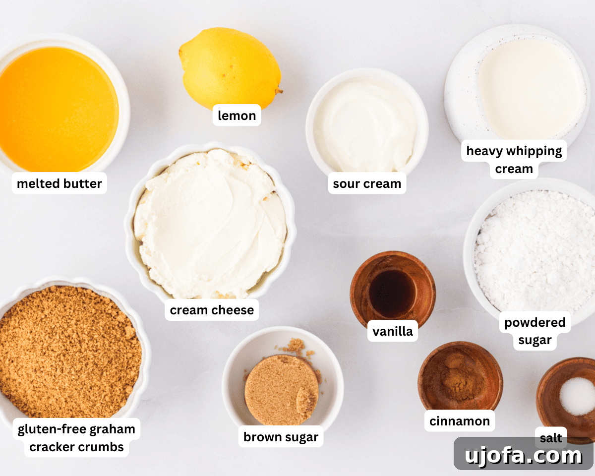 No-Oven Gluten-Free Cheesecake Bliss 4 A collection of all the necessary ingredients laid out on a clean surface, ready for preparing the gluten-free no-bake cheesecake, including gluten-free graham crackers, cream cheese, butter, sugars, and extracts.