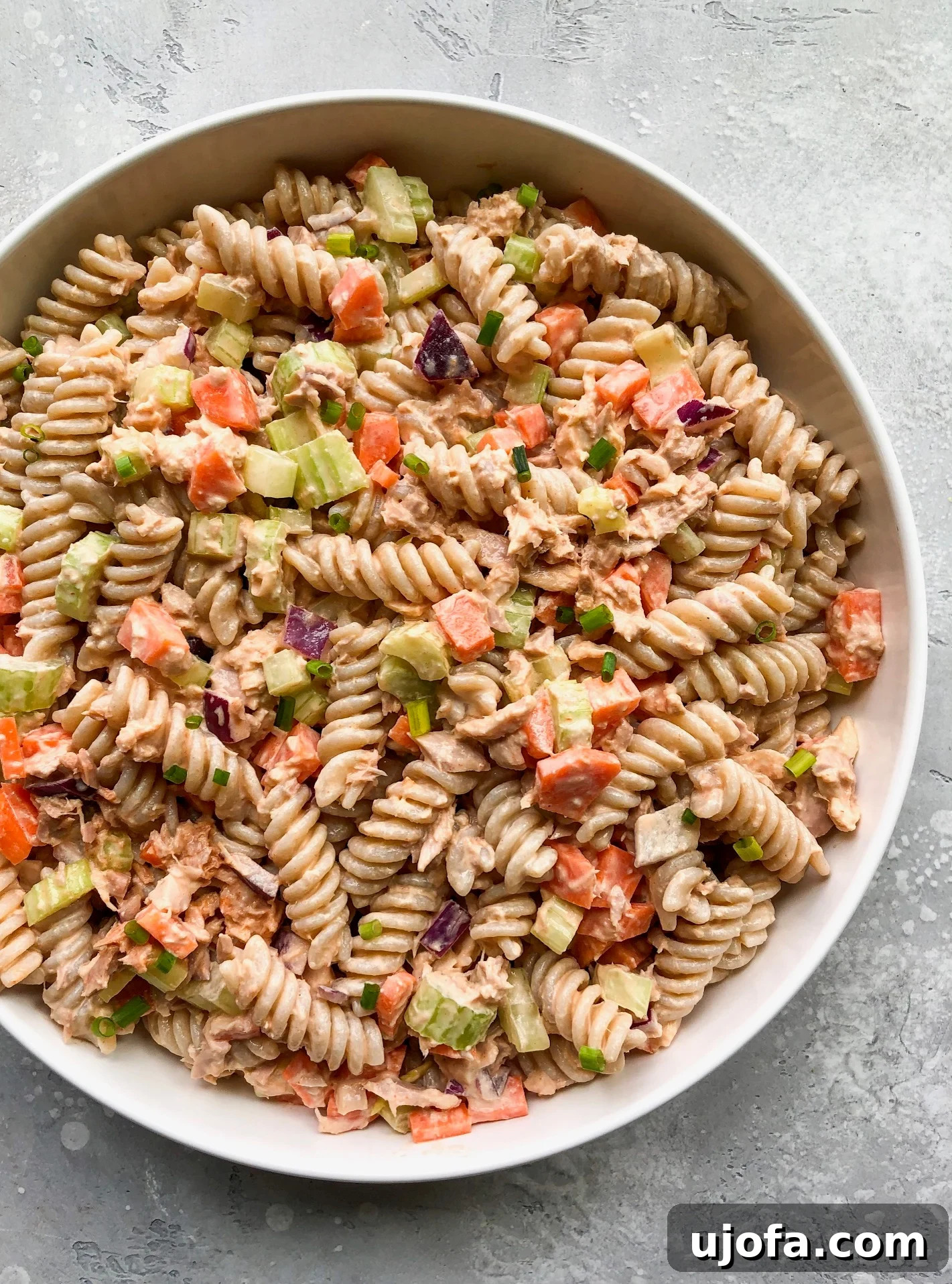 Vibrant Buffalo Tuna Pasta Salad, perfectly mixed and ready to serve, highlighting the fresh vegetables and creamy sauce.