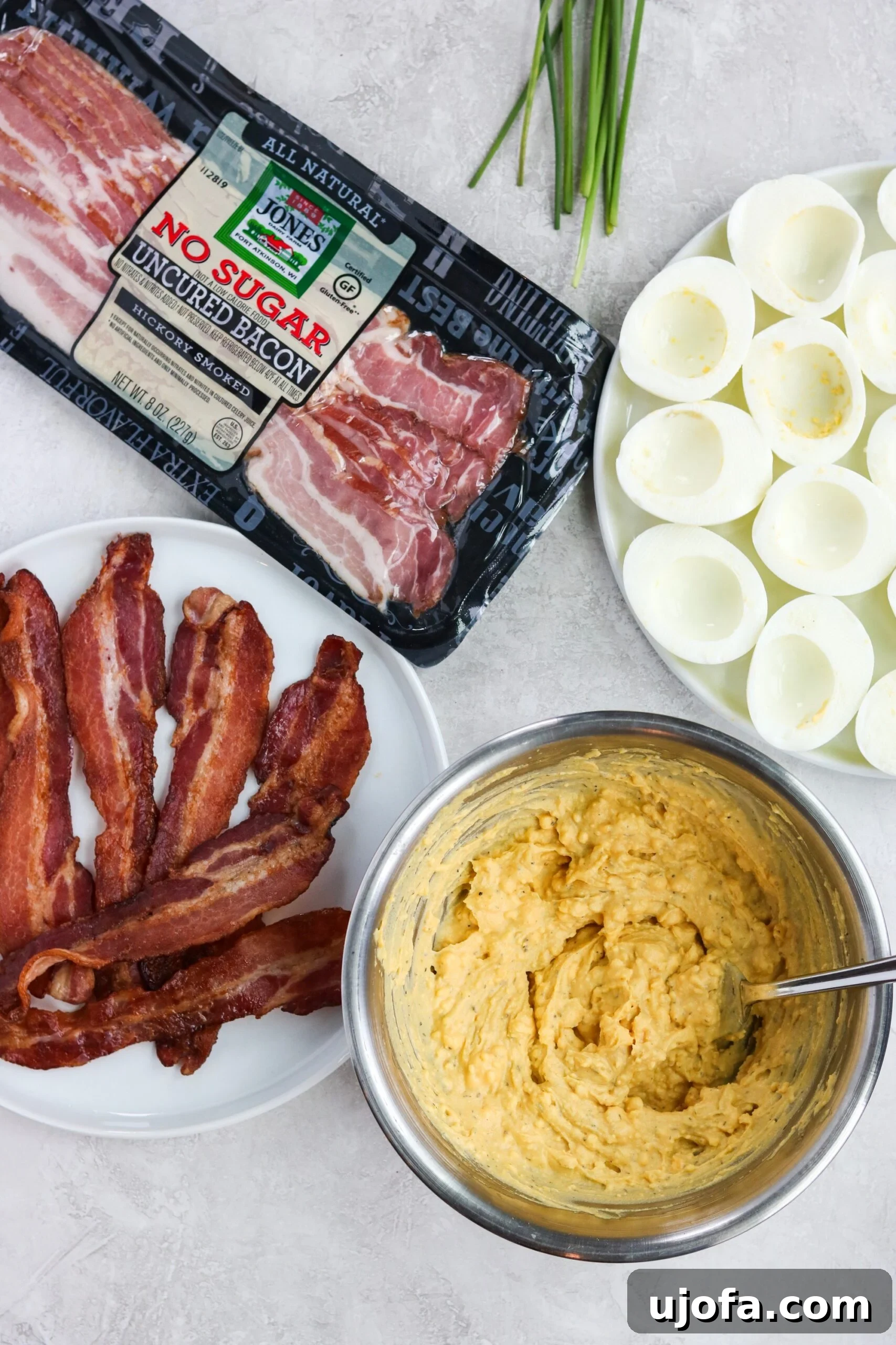 Decadent Whole30 Bacon Ranch Deviled Eggs 5 Mixing the creamy deviled egg filling ingredients
