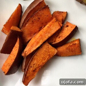 Thumbnail image of freshly roasted Chili Pumpkin Spice Sweet Potato Wedges