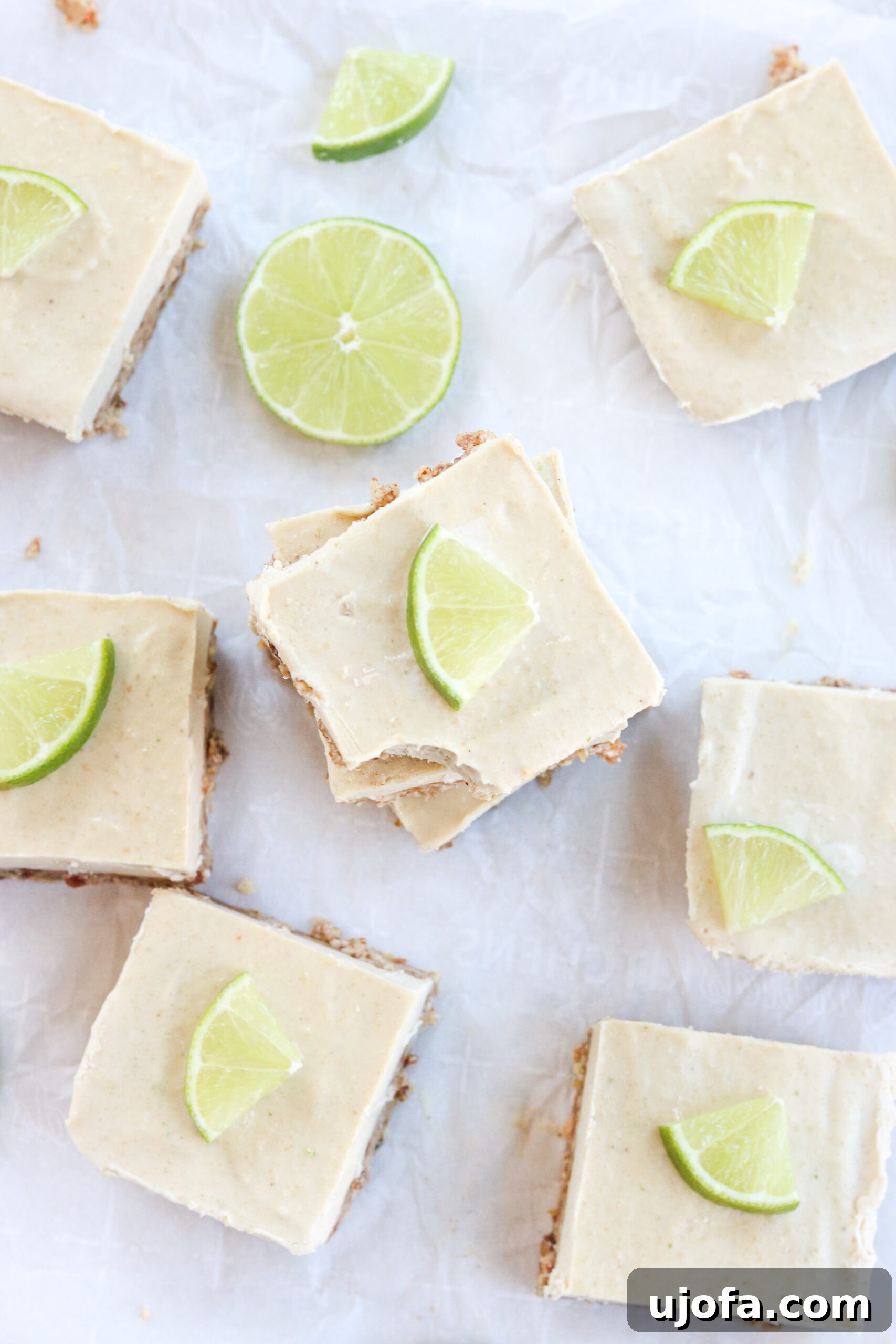 key lime pie bars on a piece of parchment paper