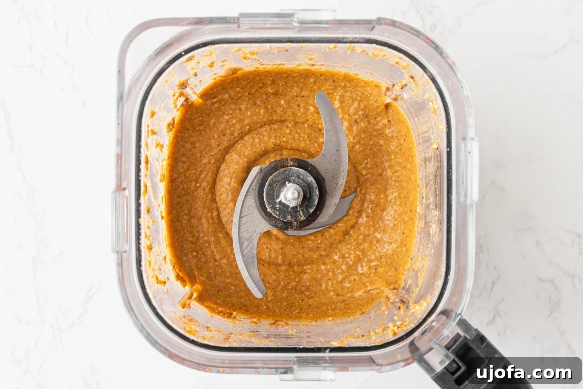 Spiced Pumpkin Cloud Muffins 5 Pumpkin, almond butter, eggs, and maple syrup blended into a smooth orange batter base for healthy flourless pumpkin muffins.