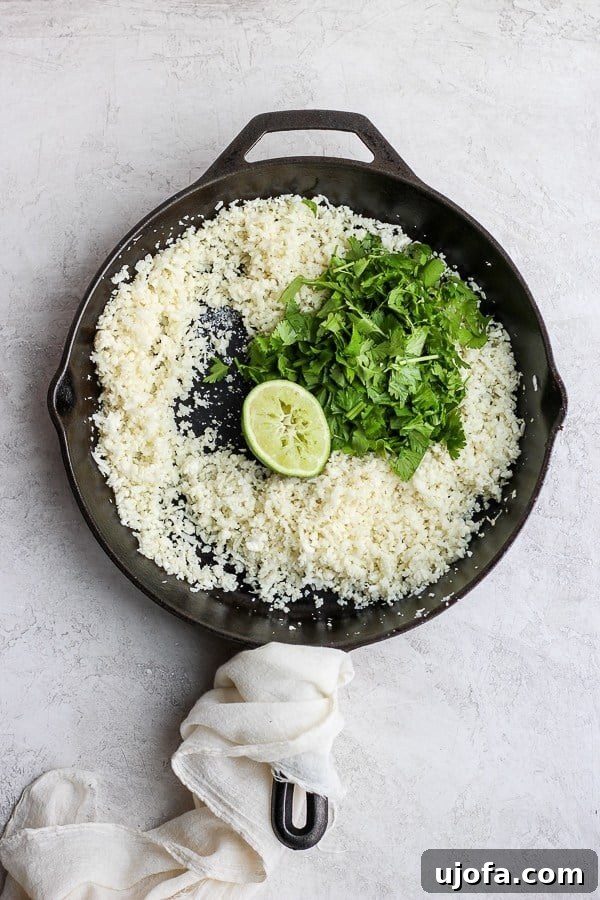 Fiesta-Ready Whole30 Paleo Mexican Meals 13 Zesty Cilantro Lime Cauliflower Rice, a fresh and flavorful low-carb side dish.