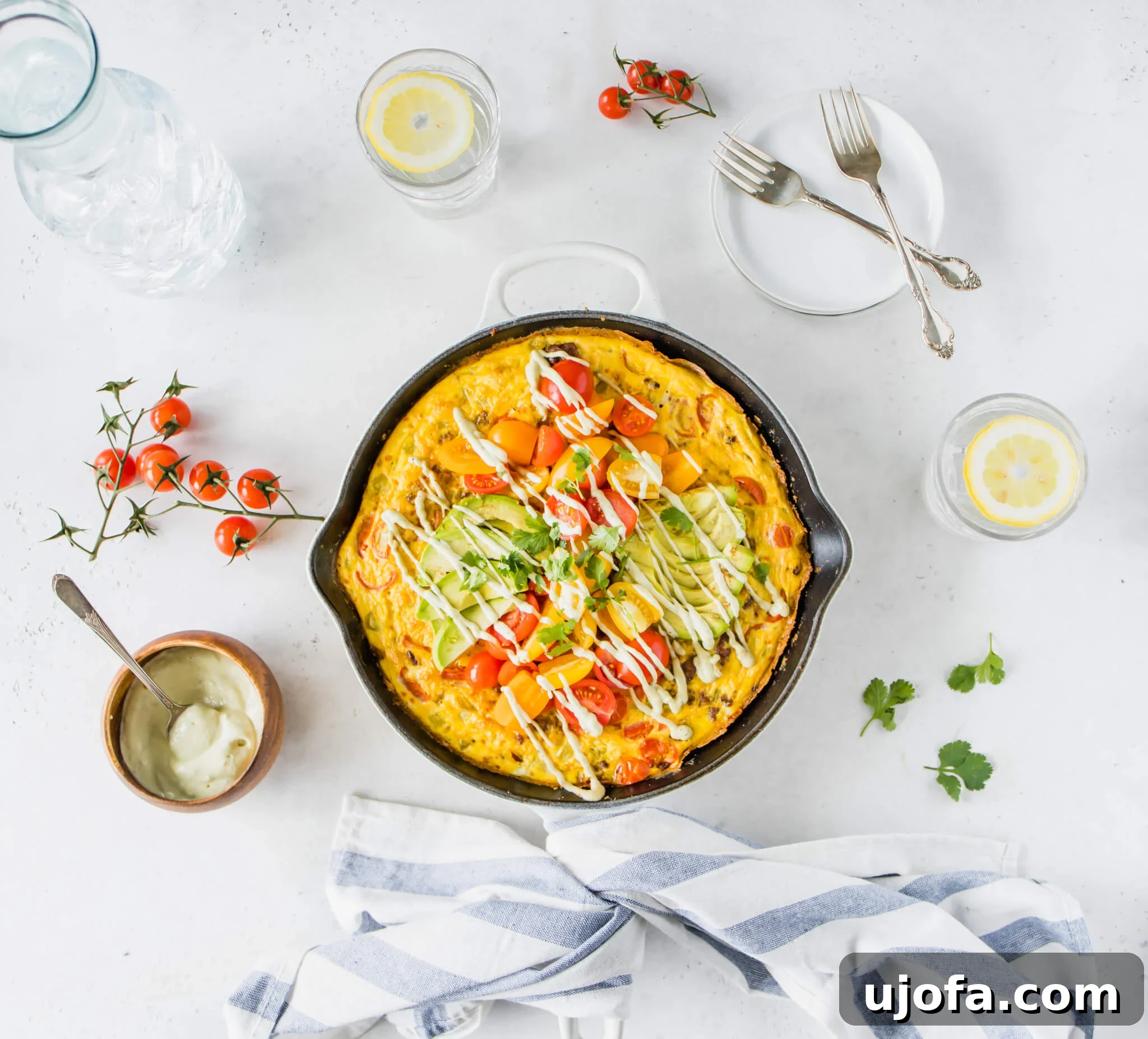 Fiesta-Ready Whole30 Paleo Mexican Meals 15 Quick 30-Minute Mexican Frittata with Beef, garnished with fresh avocado and cilantro.