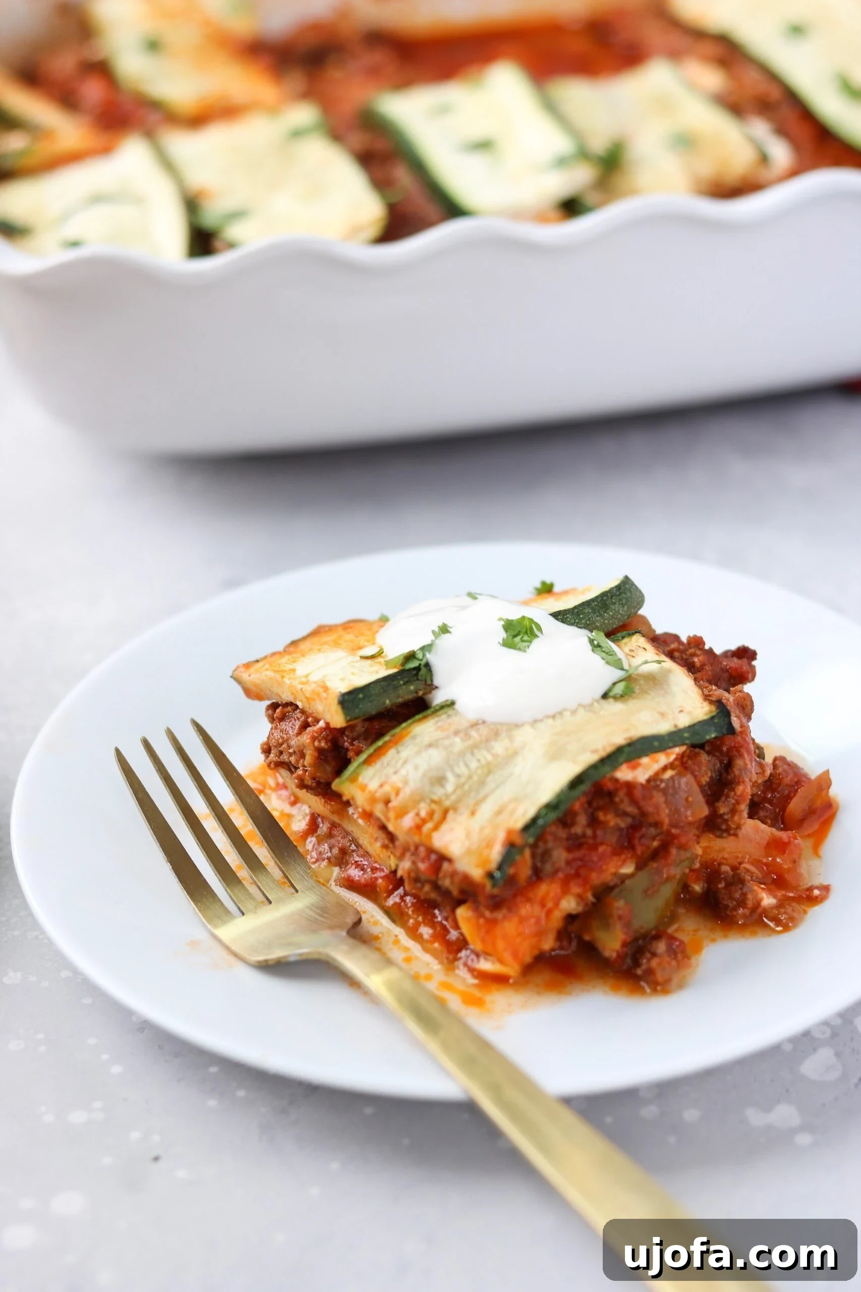 Fiesta-Ready Whole30 Paleo Mexican Meals 4 Layered Paleo Mexican Lasagna with rich sauce and seasoned meat, a comforting gluten-free meal.