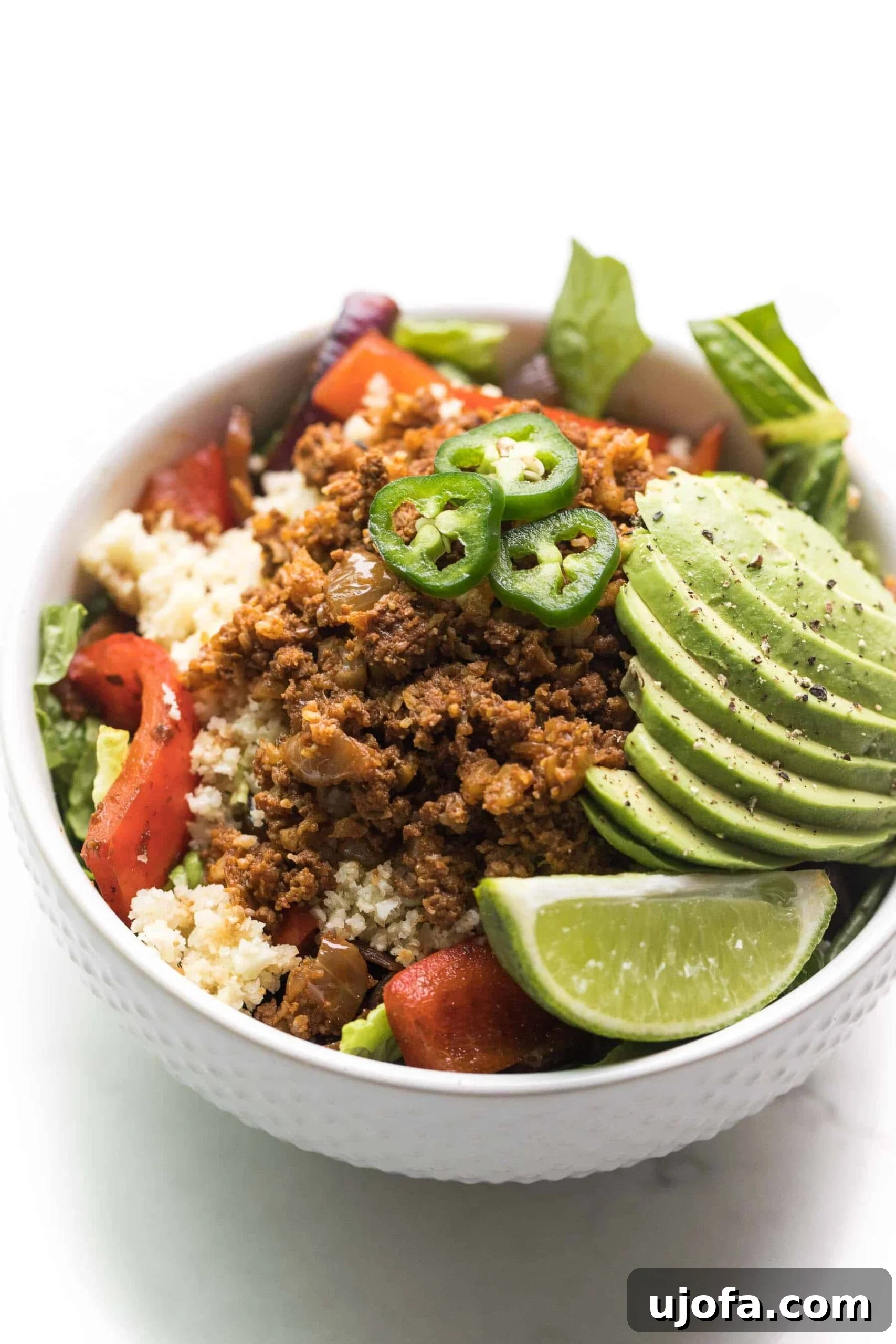 Fiesta-Ready Whole30 Paleo Mexican Meals 6 Wholesome Whole30 Ground Beef Burrito Bowl, loaded with fresh ingredients like avocado and salsa.