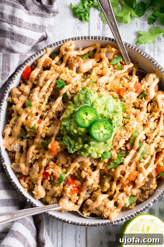 Fiesta-Ready Whole30 Paleo Mexican Meals 7 Colorful Mexican Cauliflower Fried Rice, a healthy and low-carb side dish.