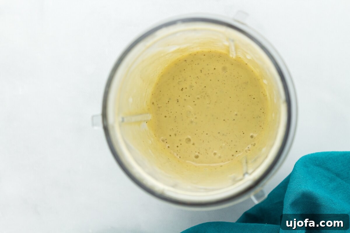Creamy Dairy-Free Caesar Dressing 6 Dairy-free Caesar dressing blended until smooth and creamy inside a blender