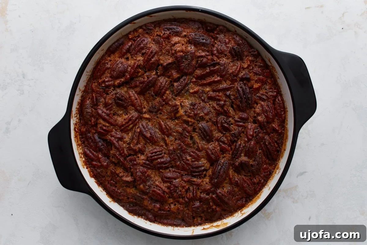 Crust Free Pecan Perfection 8 The crustless pecan pie freshly removed from the oven, golden brown on top and perfectly set.
