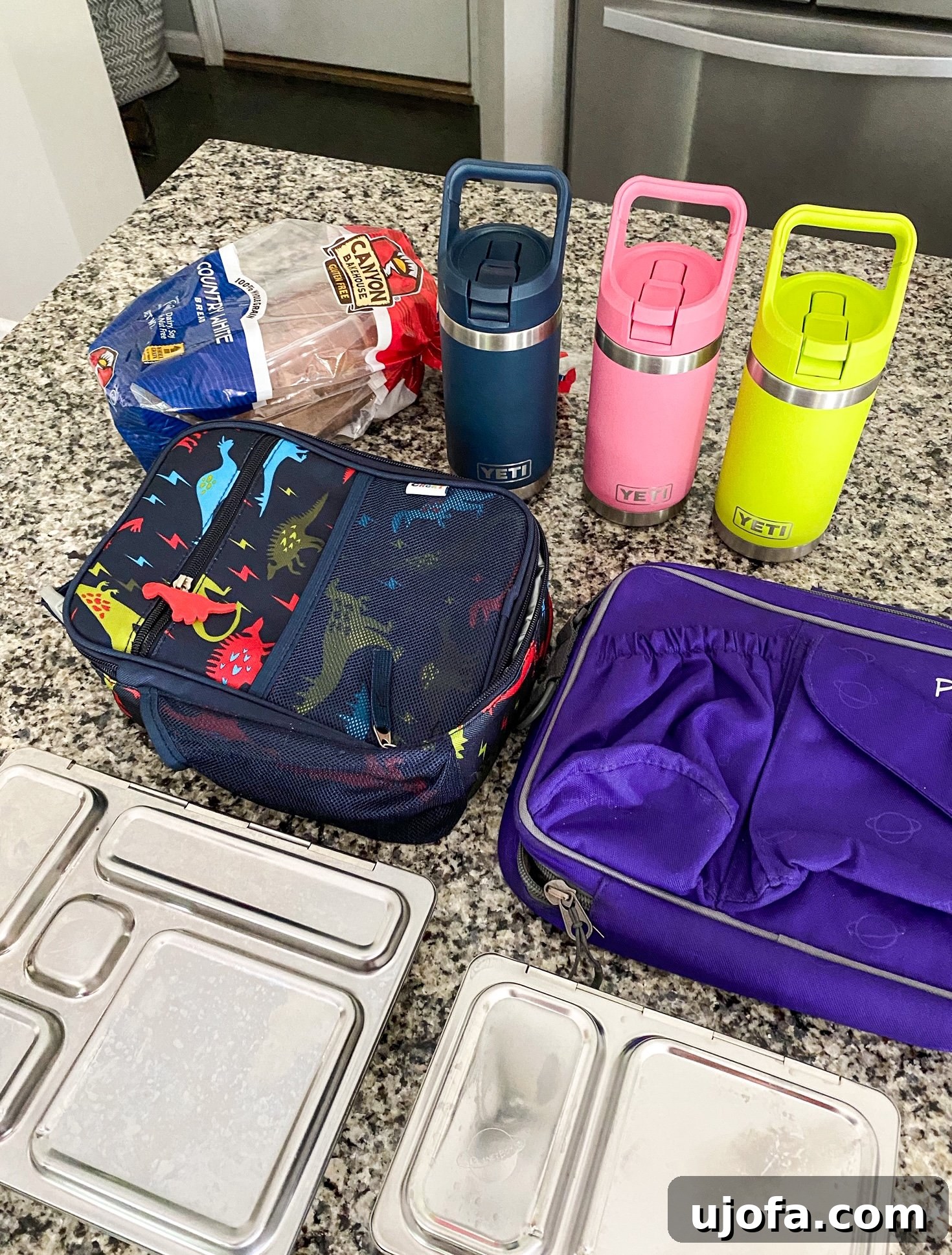 Smart Starts: Time-Saving Back-to-School Secrets 4 Neatly packed school lunches and refilled water bottles prepared the night before.