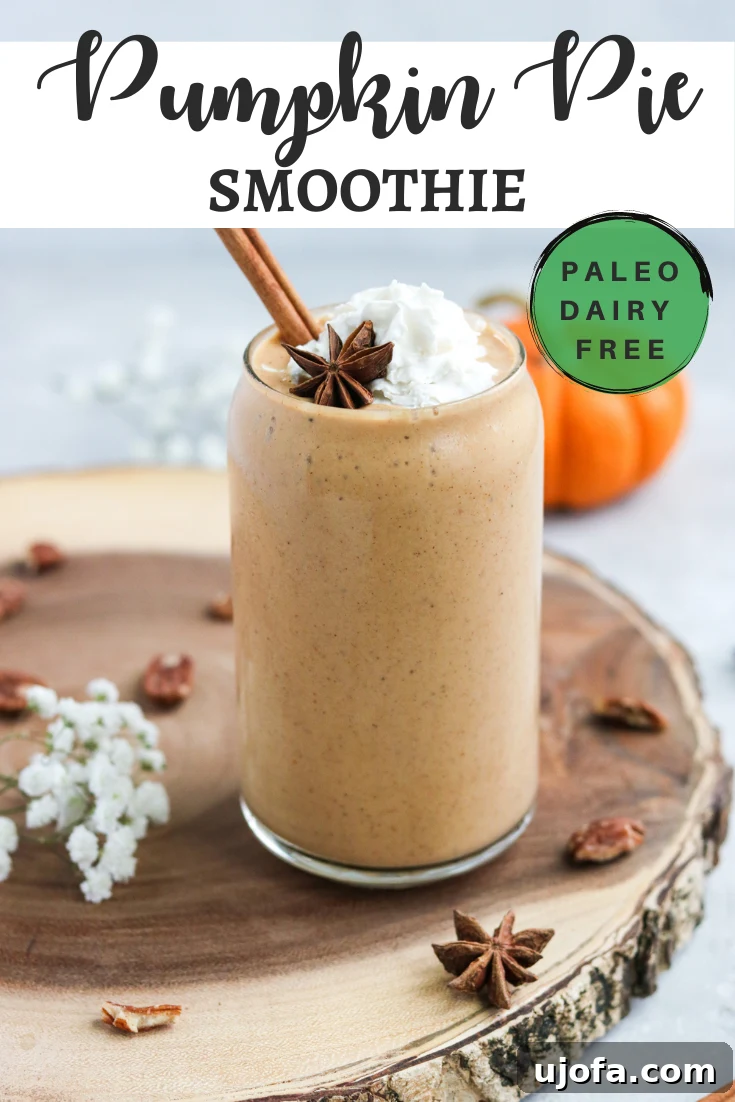 Paleo Pumpkin Spice Dream 4 Various ingredients for a Paleo Pumpkin Pie Smoothie including pumpkin puree, spices, and a frozen banana, arranged on a rustic wooden board
