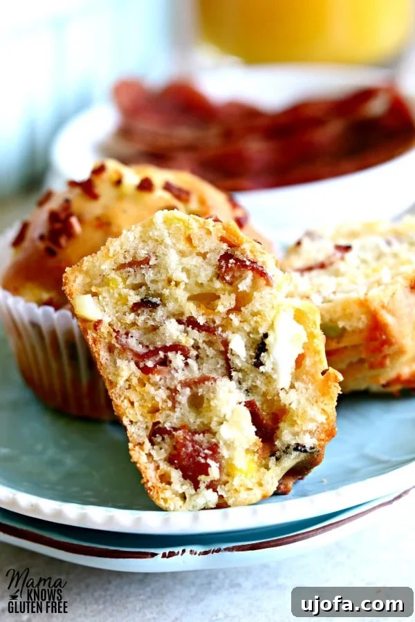 Another beautiful shot of freshly baked Gluten-Free Bacon, Egg, and Cheese Muffins on a cooling rack.