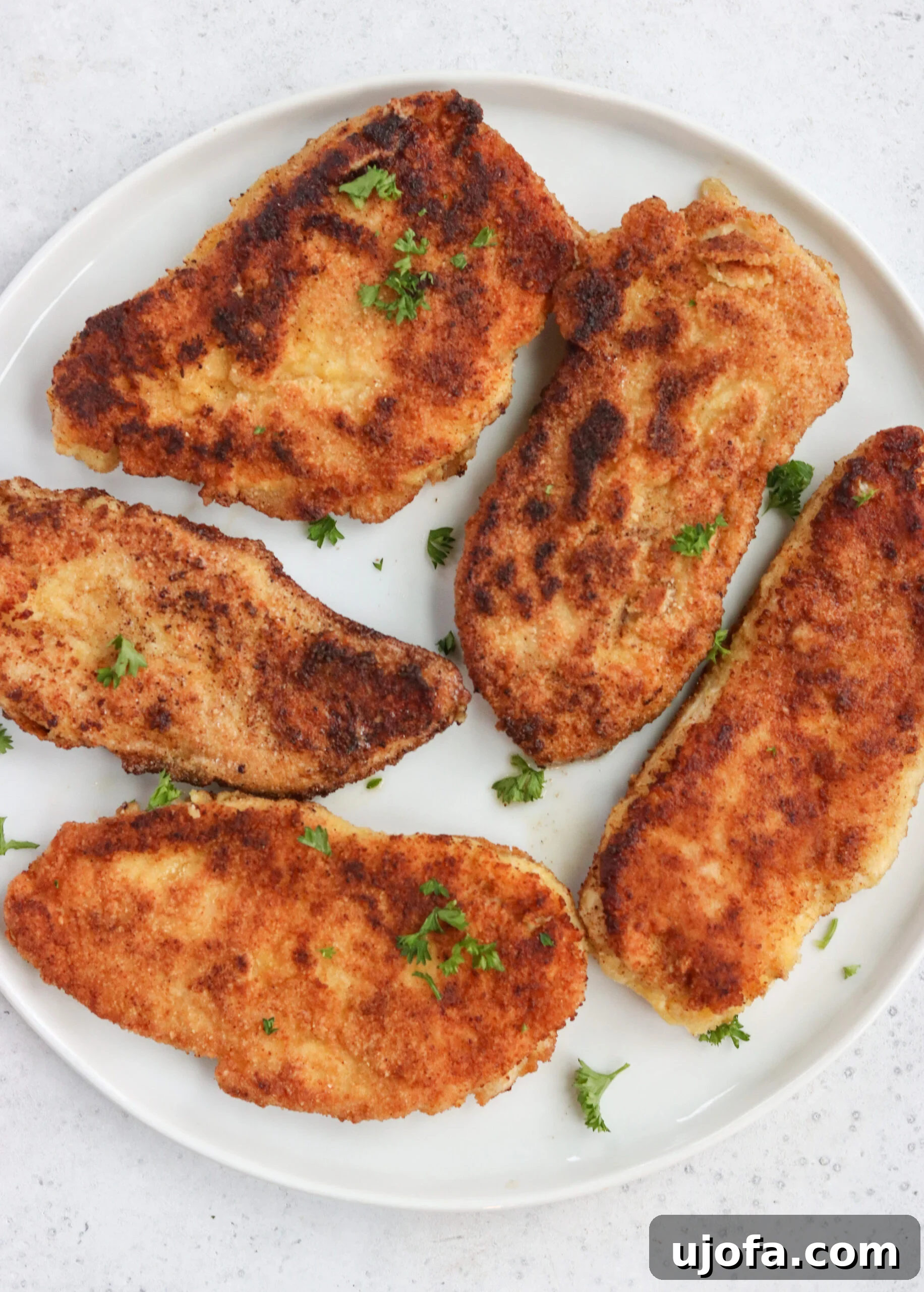 Whole30 Crispy Chicken Cutlets 2 Delicious Whole30 Fried Chicken Cutlets on a plate