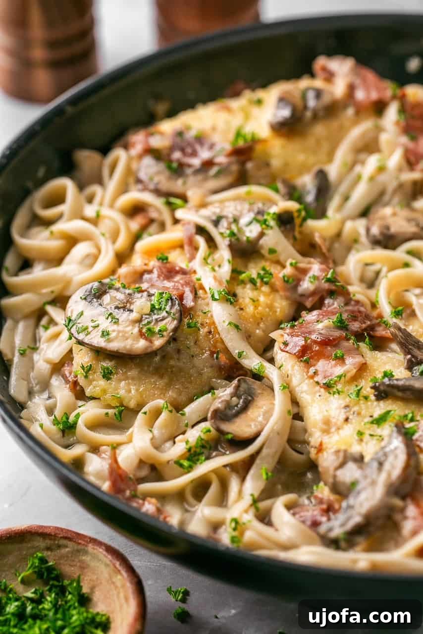 Quick Chicken Marsala Fettuccine with Crispy Prosciutto 2 chicken marsala fettuccine in a skillet topped with parsley