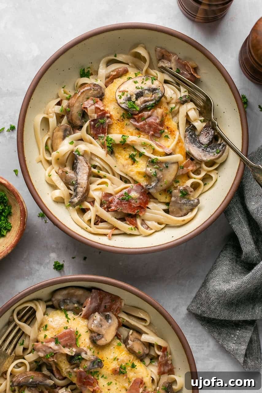 Quick Chicken Marsala Fettuccine with Crispy Prosciutto 7 chicken marsala with pasta in 2 bowls with a gray napkin next to them