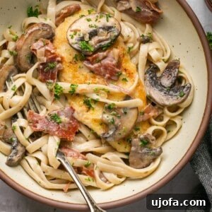 Quick Chicken Marsala Fettuccine with Crispy Prosciutto 8 chicken marsala fettuccine in a bowl with a fork
