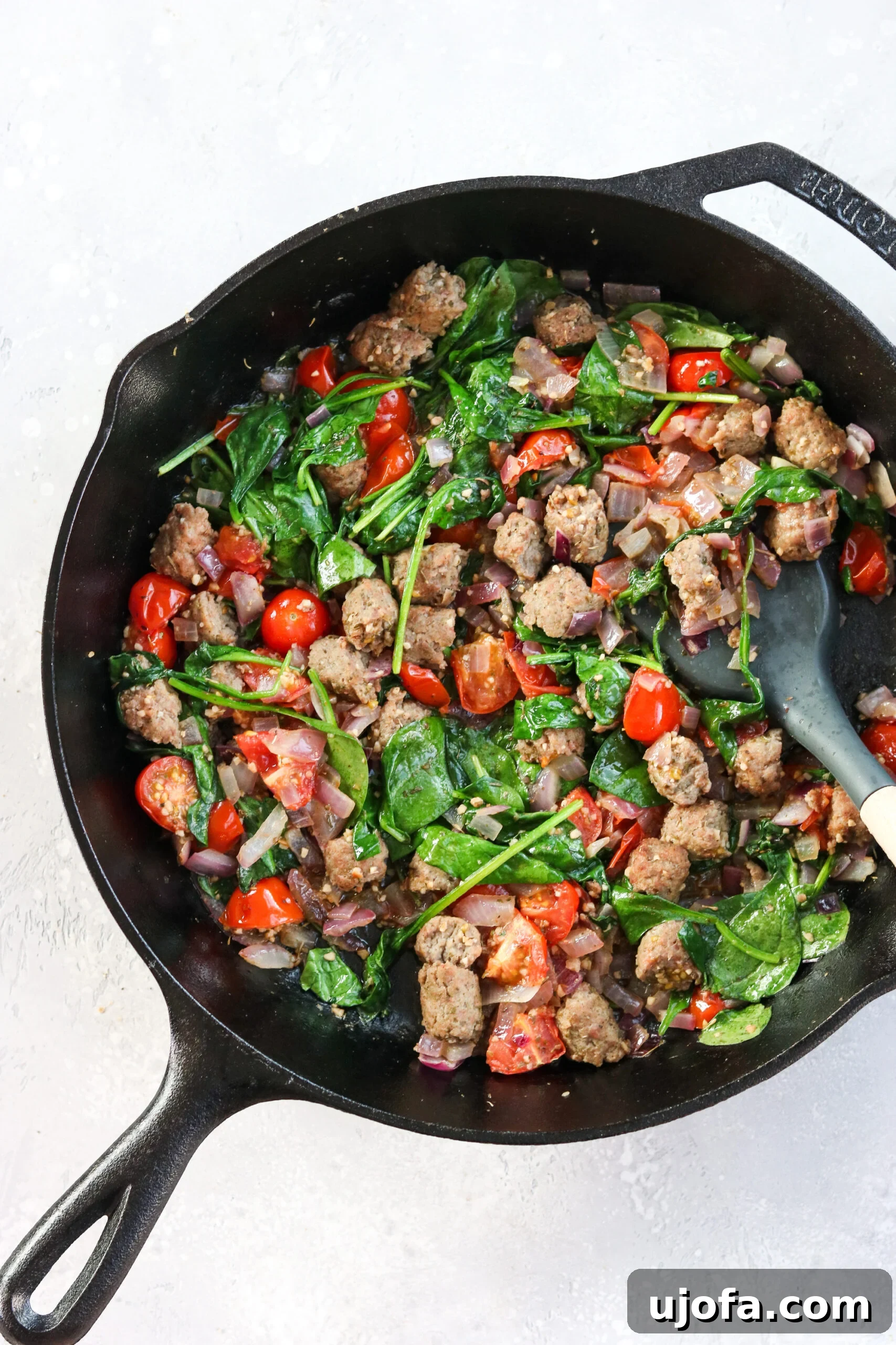 Wholesome Mediterranean Whole30 Frittata 6 Sautéed turkey sausage, tomatoes, and spinach
