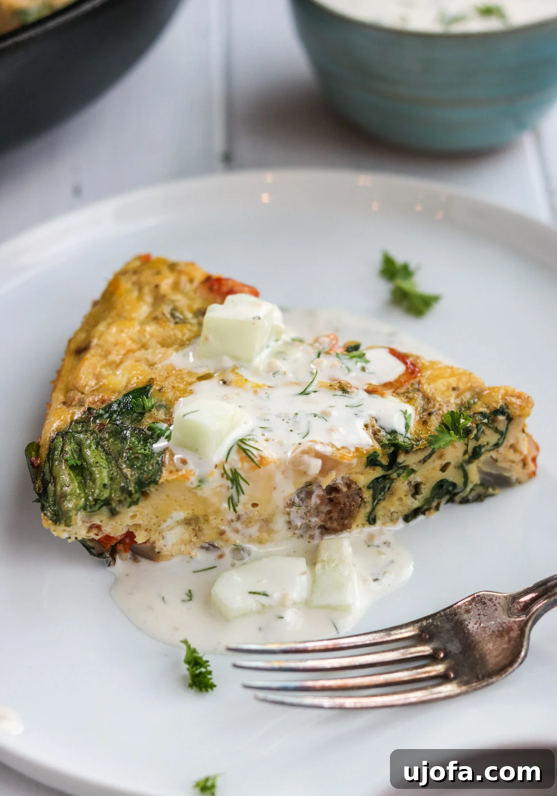 Wholesome Mediterranean Whole30 Frittata 7 Whole30 Mediterranean Frittata served with Tzatziki