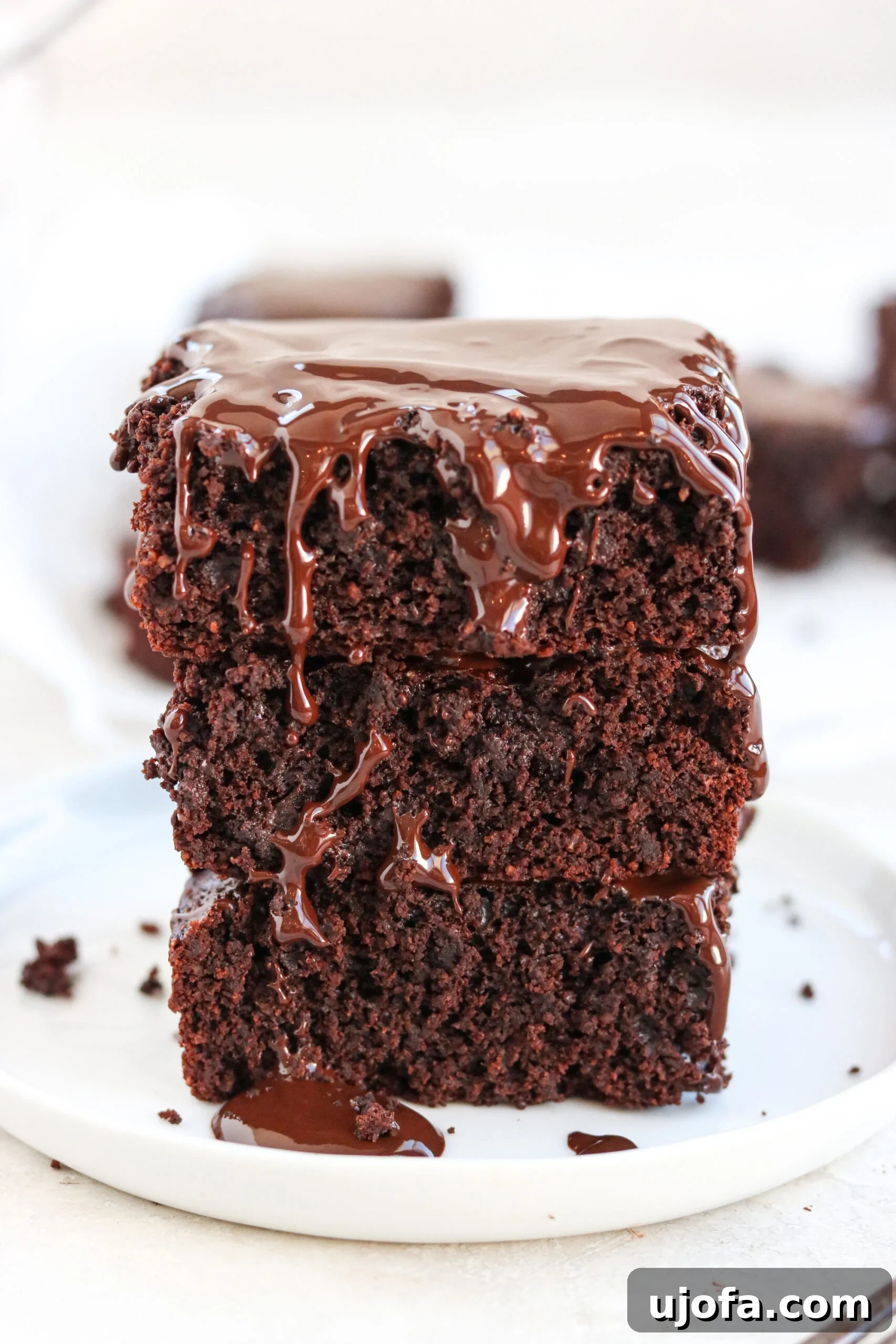 a stack of Double Chocolate Thin Mint Brownies, showcasing their rich texture and minty green hue