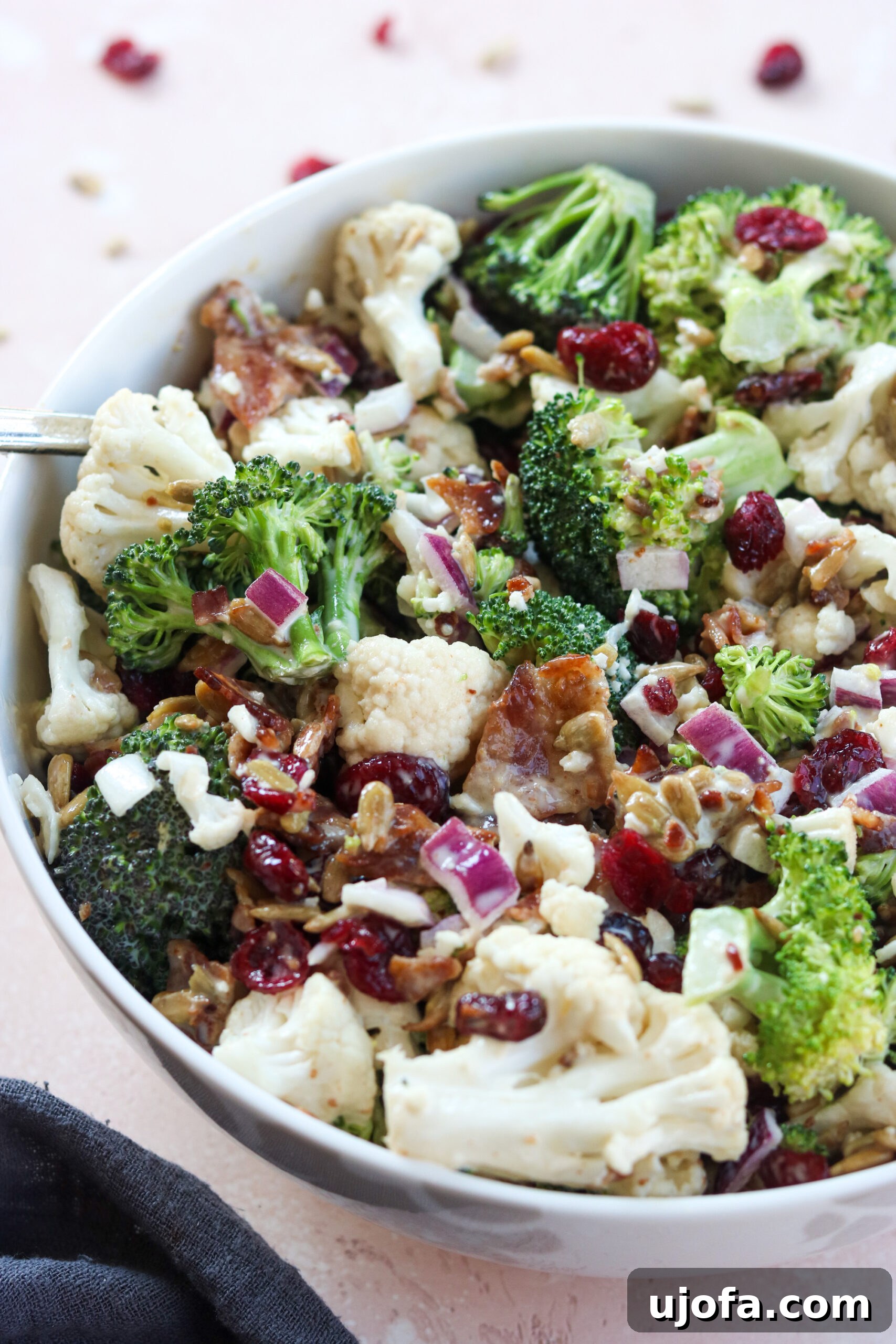 paleo salad Paleo Broccoli Salad on a white bowl
