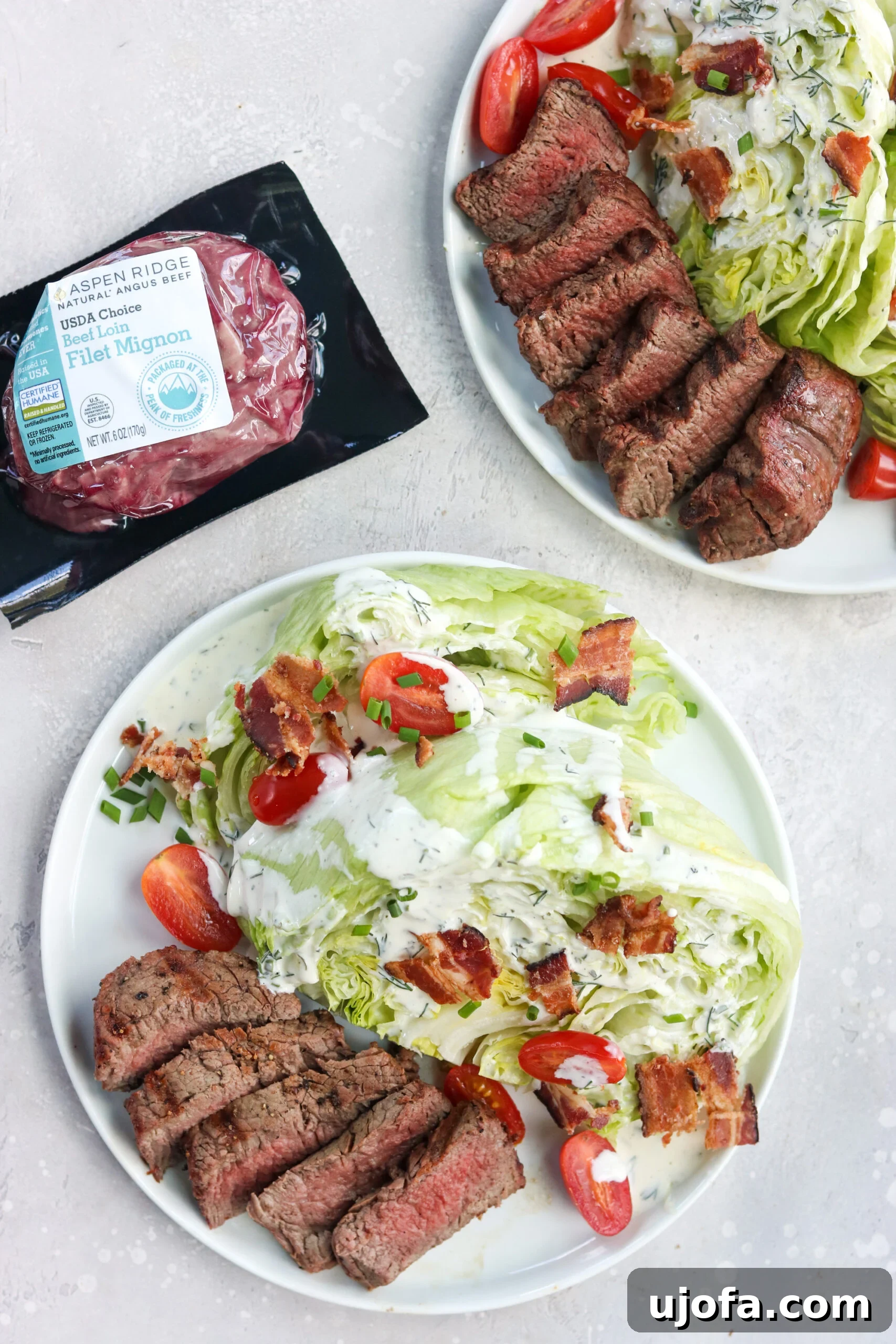 Gourmet Wedge Salad with Grilled Filet and Dairy-Free Ranch Steakhouse wedge salad with homemade ranch, featuring uncooked beef in the background, emphasizing fresh ingredients.