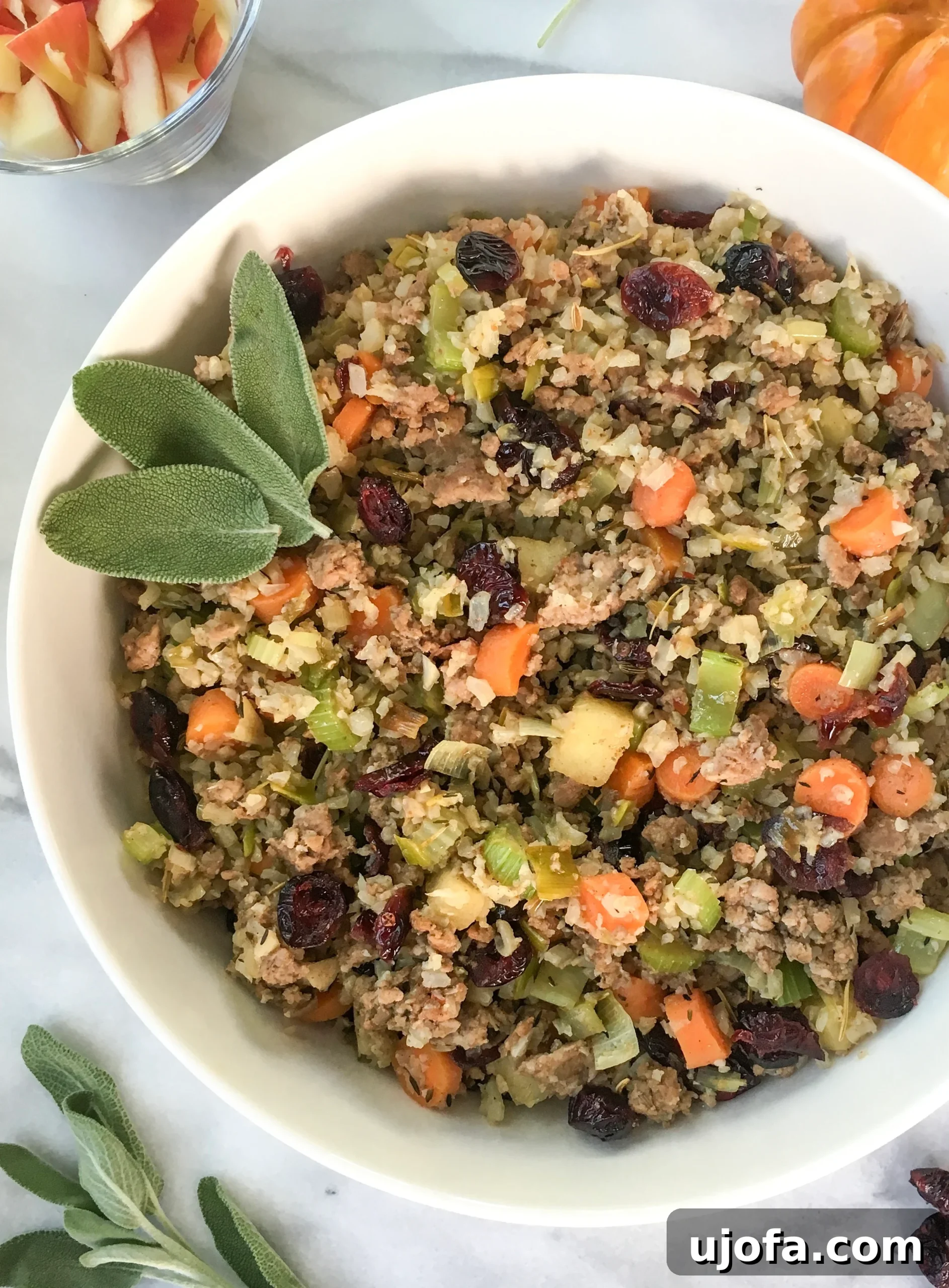 Savory Sausage and Cauliflower Rice Stuffing Whole30 Keto Paleo 2 low carb cauliflower stuffing with homemade sausage garnished with fresh sage