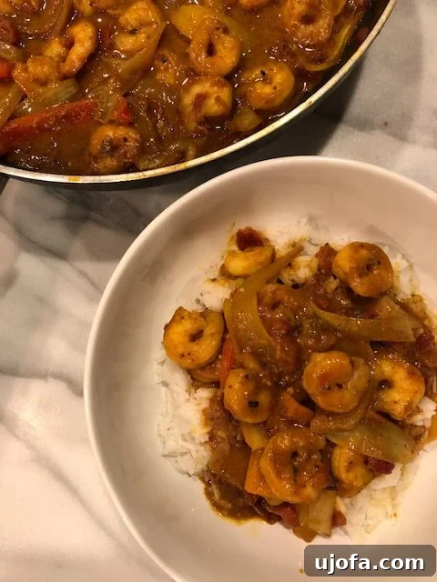 Dairy-Free Whole30 Shrimp Tikka Masala 2 Whole30 Shrimp Tikka Masala in a pan