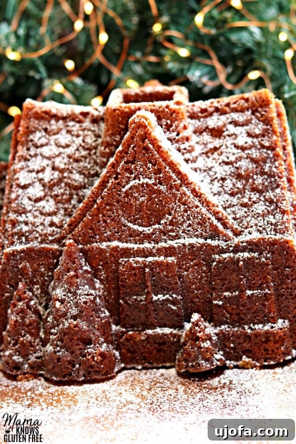 Versatile Gluten-Free Gingerbread Cake 4 Gluten-free gingerbread bundt cake shaped like a gingerbread house, dusted with powdered sugar