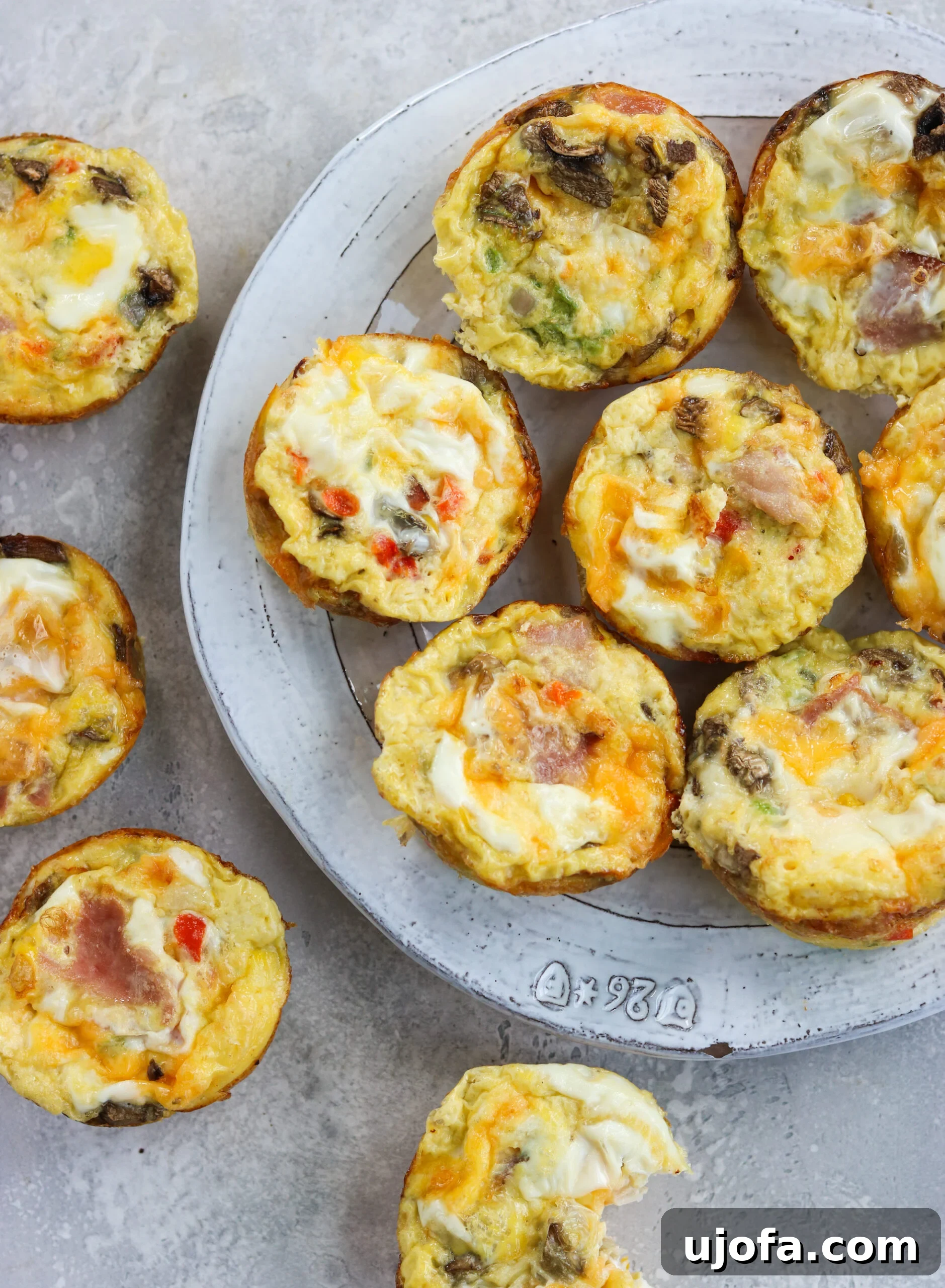top view of Western omelette egg bites Top view of cooked Western Omelette Egg Bites arranged on a surface