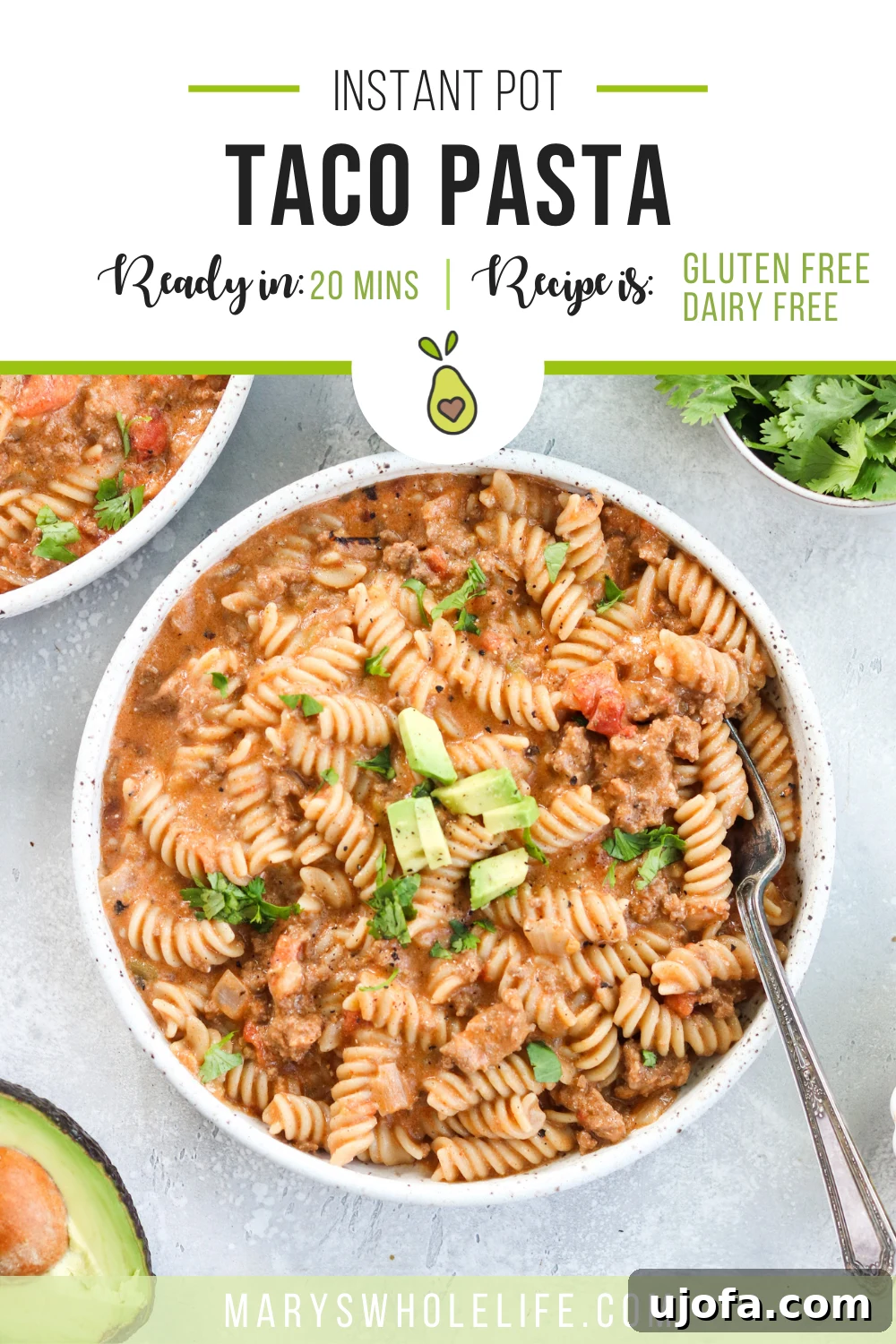 A serving of Instant Pot Taco Pasta with a fork, ready to be eaten