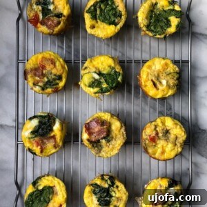 BLT Egg Cups with bacon, spinach, and tomato, a perfect Whole30 breakfast.
