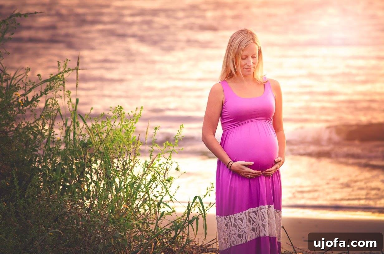 Thriving Beyond Postpartum Anxiety 5 Pregnant woman showing her baby bump in a maternity photoshoot.