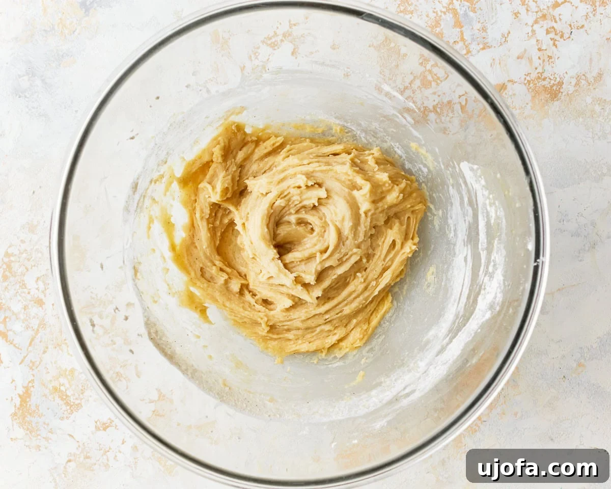 thick batter in a glass bowl.