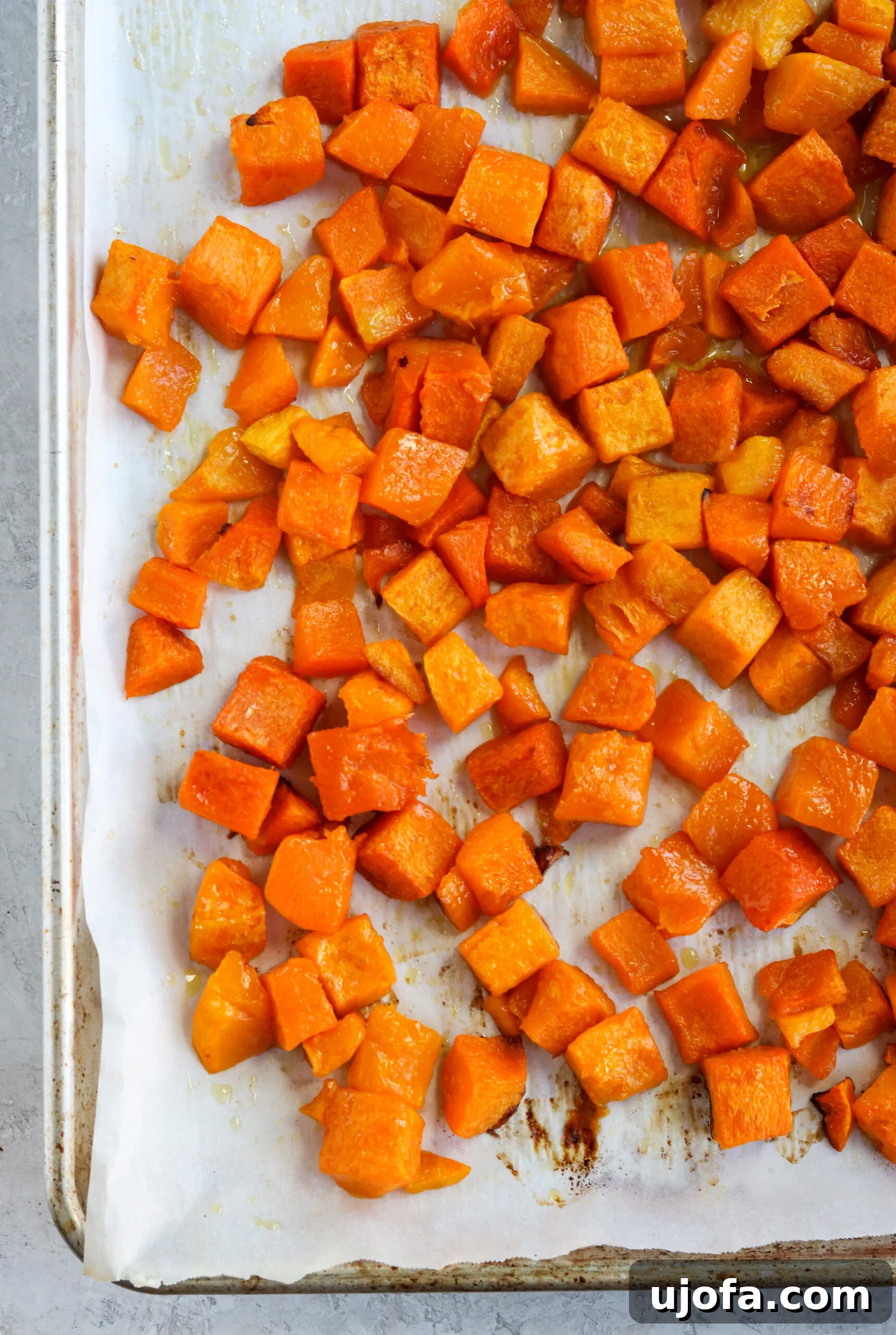Autumn's Bounty Salad with Maple Apple Cider Vinaigrette 6 Roasted butternut squash on a sheet pan, perfectly caramelized for a fall harvest salad