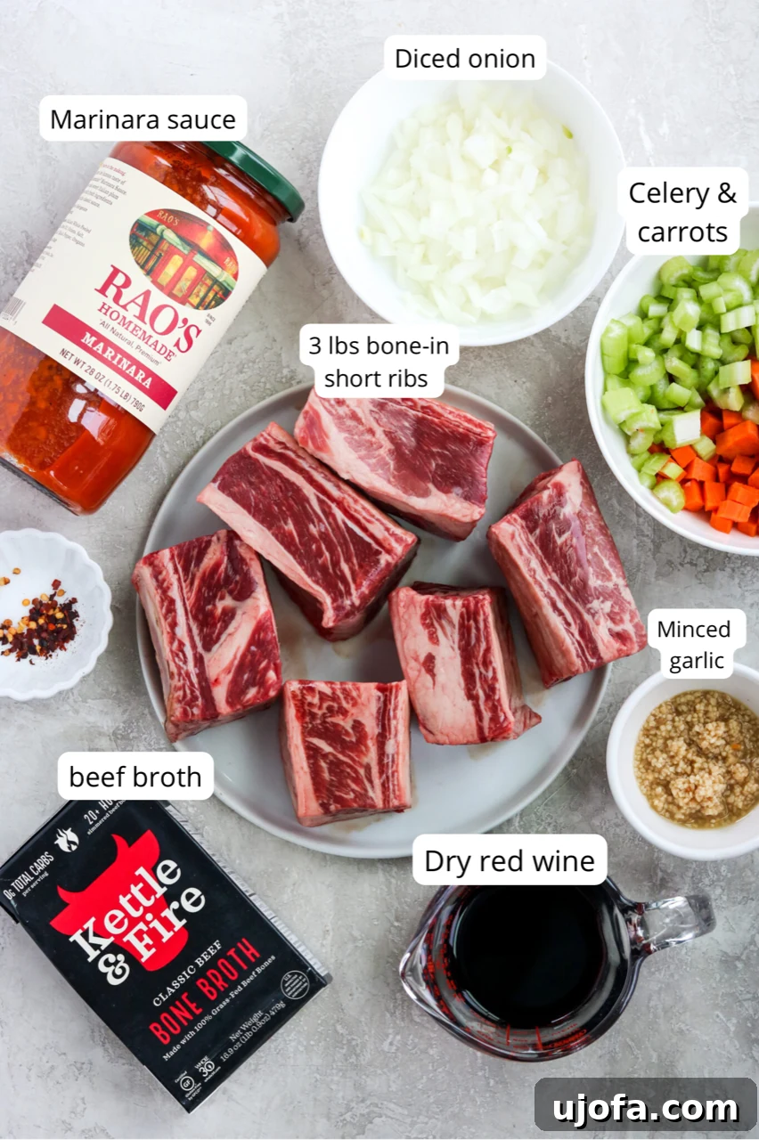 Essential ingredients laid out for making the Instant Pot Short Rib Ragu, showcasing fresh vegetables and seasonings.