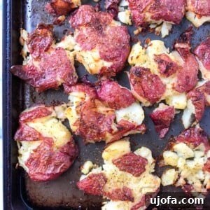 Crispy Herb Ghee Smashed Potatoes recipe image