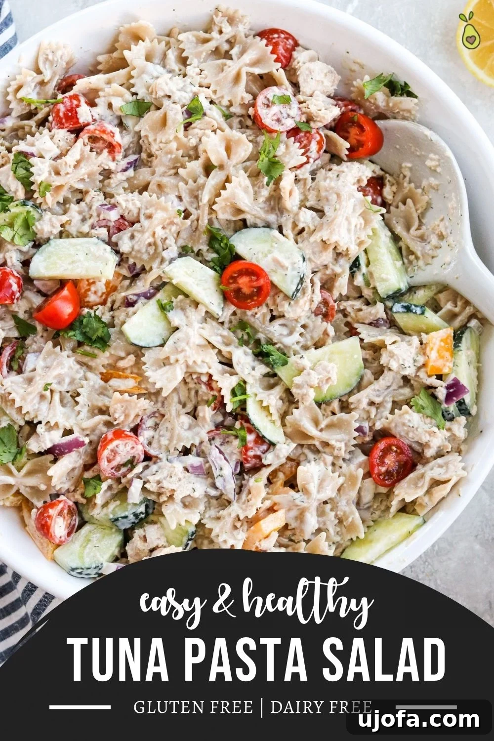A tall, vertically oriented image suitable for Pinterest, featuring an easy and healthy gluten-free tuna pasta salad, ideal for pinning and sharing.