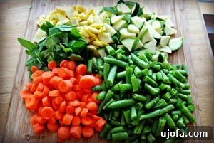Freshly chopped vegetables ready for Italian soup in a slow cooker
